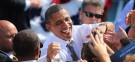 President Obama greets voters after speaking at a campaign rally in Delray Beach, Fla., on Oct. 23: The incumbent's campaign that it has the most sophisticated get-out-the-vote operation in U.S. history.