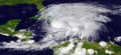 Hurricane Sandy left 21 people dead in the Caribbean before it began making its way to the northeastern United States.