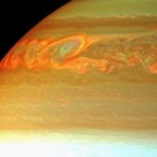 The colored swirls indicate the tail end of Saturn's massive storm that occurred sometime between 2010 and 2011.
