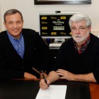 Walt Disney chairman and CEO Bob&nbsp;Iger (left) and Lucasfilm founder George Lucas sign the agreement that hands over Star Wars, and the rest of Lucas' company, to Disney.