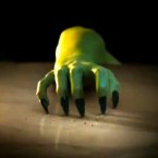The trailer offers a tantalizing glimpse of the infamous Wicked Witch: A creepy, green hand.