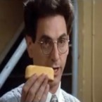 Egon from the Ghostbusters crew holds up a Twinkie to represent the psychokinetic energy in New York City.