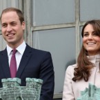 Catherine and William smile at crowds from the balcony of the Cambridge Guildhall during an official visit on Nov. 28.
