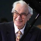 Dave Brubeck where he most comfortable: Behind a piano.