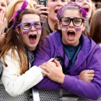 When you care enough to scream the very best: Two Bieber fans fail to maintain their composure during a performance in Sydney, Australia.