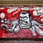 Graffiti depicting Mohamed Morsi covers an outer wall of the presidential palace in Cairo, Egypt.