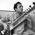 The beloved composer and musician Ravi Shankar plays the sitar on May 31, 1966.