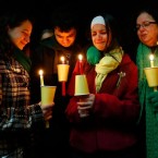Donna Soto, far right, along with her children Jillian, far left, Matthew, and Karly, mourn for her other daughter Victoria Soto, a 1st-grade teacher who was killed at Sandy Hook Elementary School.