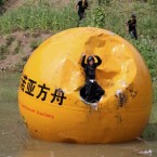 Inventor Yang Zongfu tests one of his anti-disaster bubbles in China.