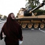 An Egyptian protester chants slogans against President Morsi outside the presidential palace in Cairo on Dec. 18.