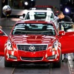 The first 2013 Cadillac ATS rolls off the assembly line at the General Motors Lansing Grand River plant on July 26.