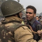 Delhi police try to disperse demonstrators protesting after the gang-rape of a 23-year-old woman.