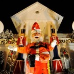 Ho, ho, ho: A giant Santa Claus sits in front of a house in the Dyker Heights neighborhood of Brooklyn.