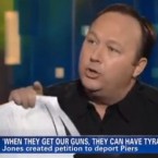 Alex Jones seen on CNN with Piers Morgan.