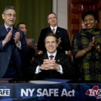 New York Gov. Andrew Cuomo and legislative leaders applaud after Cuomo signed New York's Secure Ammunition and Firearms Enforcement Act into law on Jan. 15.